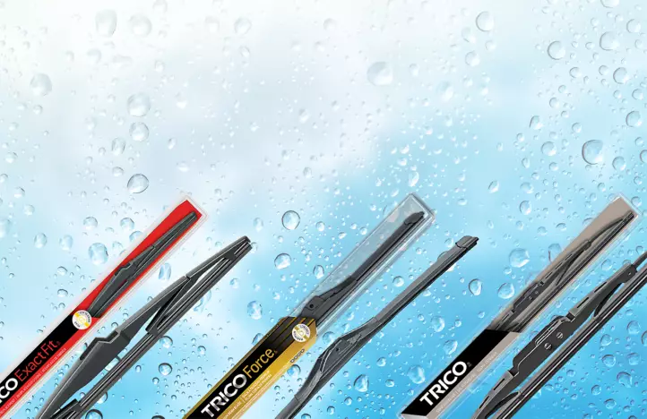 windshield wipers on rain-covered glass